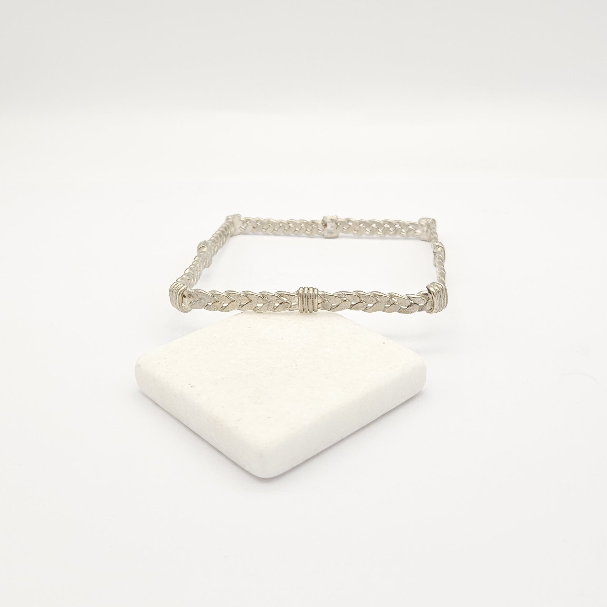 Braccialetto intrecciato stile "quad"