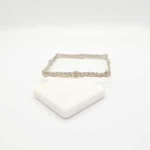 Braccialetto intrecciato stile "quad"