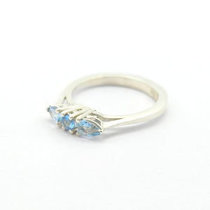 Anello trilogy con acquamarina